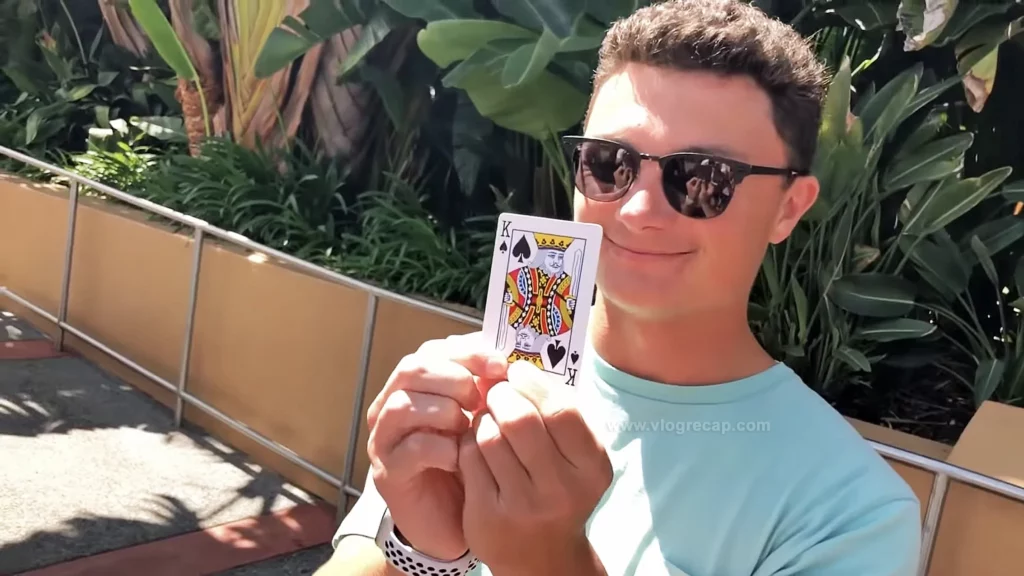 Cam Doerer holding a playing card