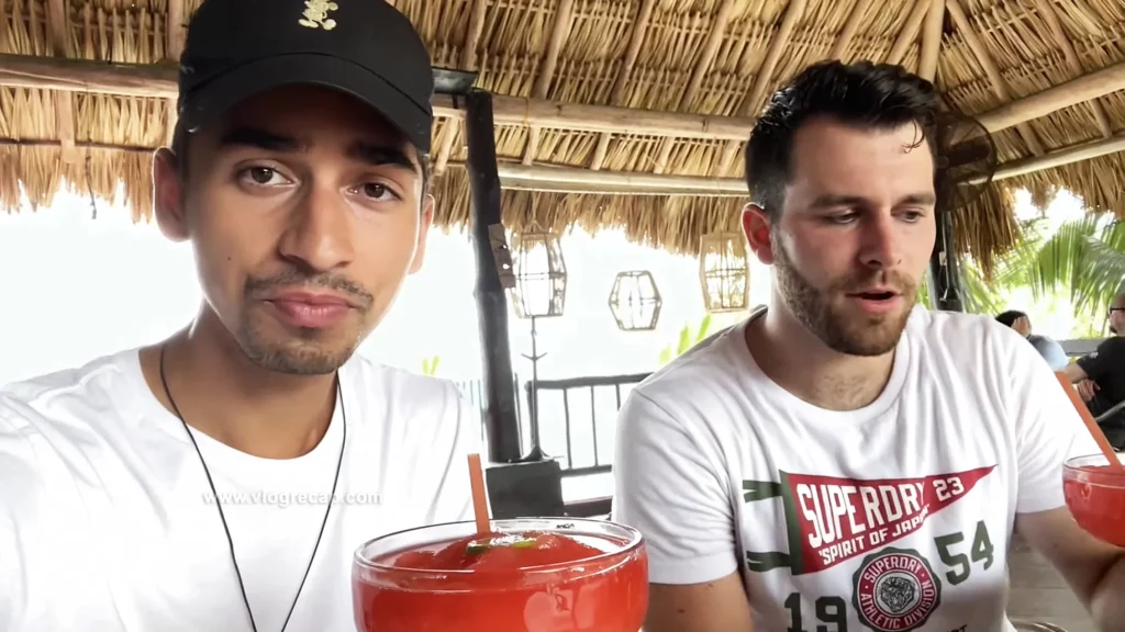 JoJo Crichton and Kyle Pallo drinking a margarita in Cozumel