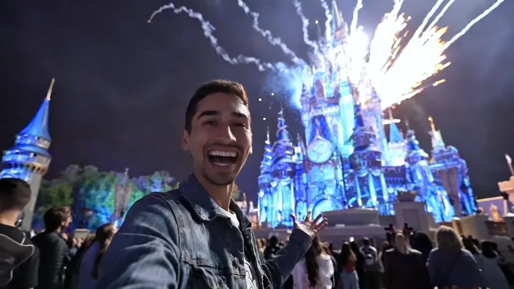 JoJo Crichton in front of Cinderella Castle watching Happily Ever After Fireworks