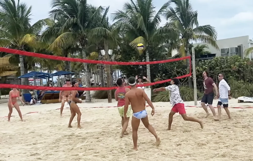 JoJo Crichton playing volleyball at Virgin Voyages’ beach club in Bimini