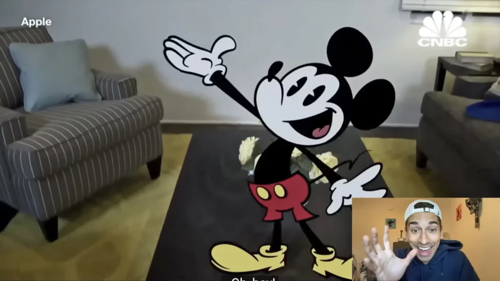 JoJo reacting to an augmented reality view of Mickey Mouse using Apple Vision Pro