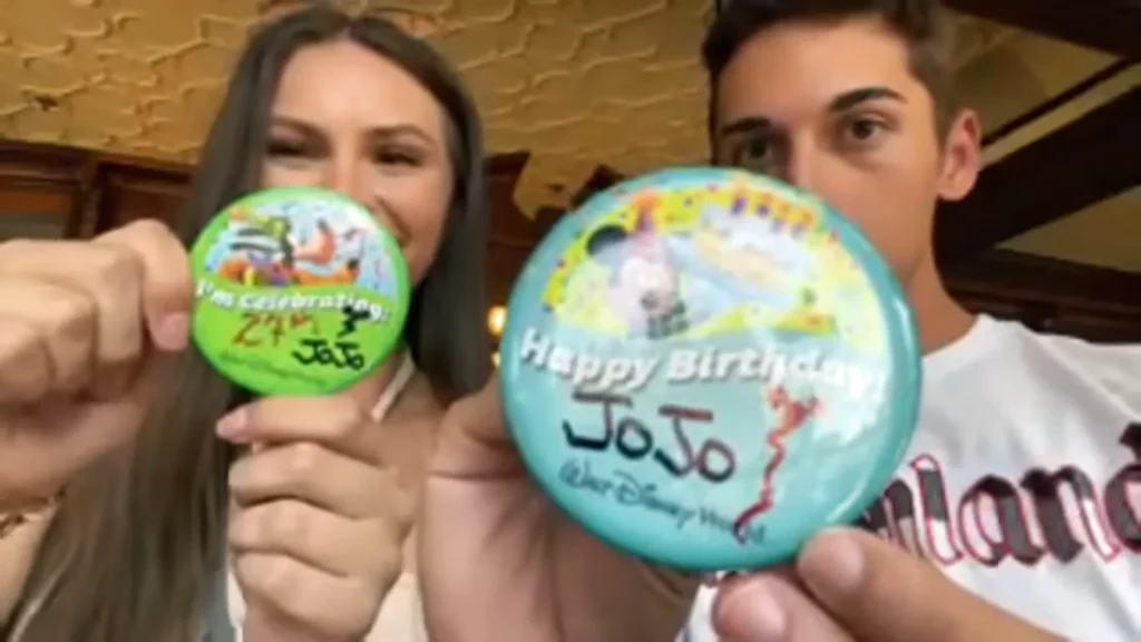 Krista Lynn and JoJo Crichton with button commemorating JoJo's birthday